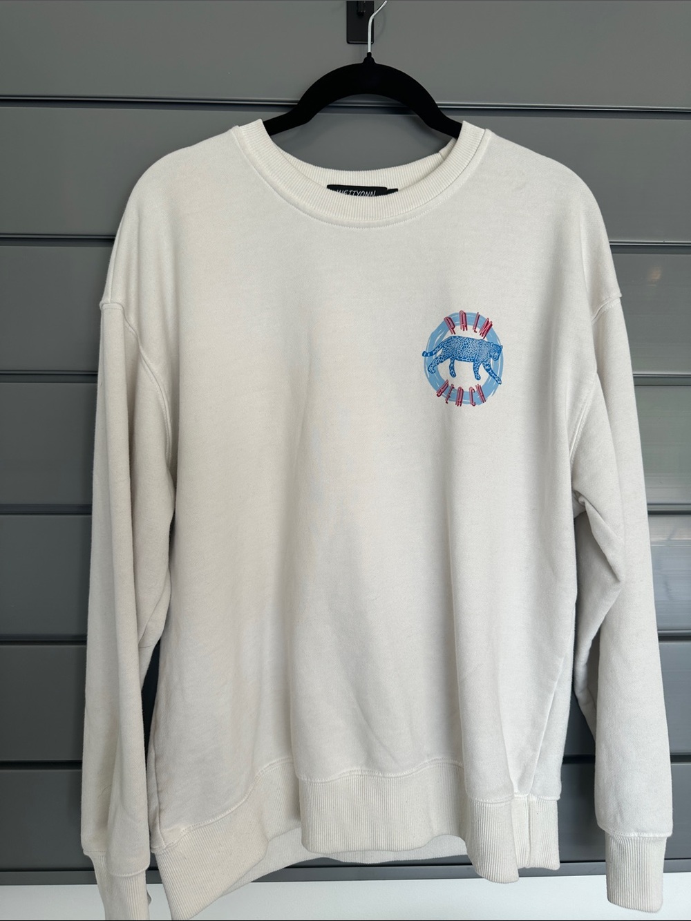 Men's Crewneck Sweatshirt in White with Blue Embroidered Animal